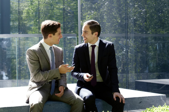 2 male executives - informal discussion